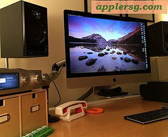 Mac Setup: Armmontierter 27 "iMac mit einem wunderschön aufgeräumten Schreibtisch